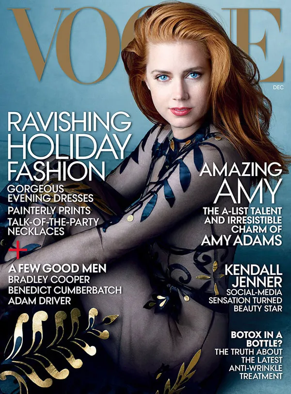 Vogue cover with a woman looking at the camera.